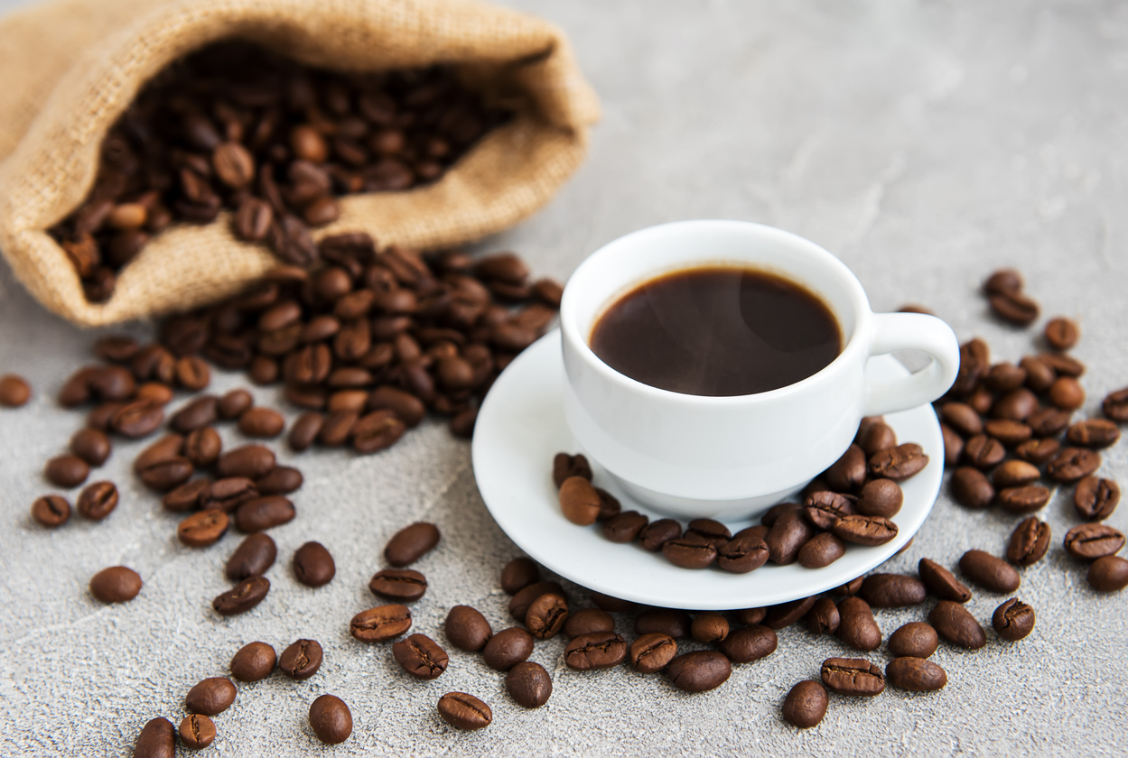 Coffee beans and cup of coffee.jpg